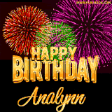 A golden 'Happy Birthday Analynn' message with vibrant fireworks in the background, creating a festive and celebratory vibe in this animated name GIF.