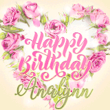 A stunning heart made of pink roses surrounds the elegant script text 'Happy Birthday Analynn' on a soft beige background. Animated sparkles add a magical and festive feel.