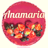 Beautifully decorated red velvet berry birthday cake with vibrant fruits and a glowing 'Anamaria' name, adding a touch of sweetness and sparkle.
