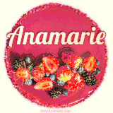 Beautifully decorated red velvet berry birthday cake with vibrant fruits and a glowing 'Anamarie' name, adding a touch of sweetness and sparkle.