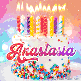 A cheerful white birthday cake with multicolor sprinkles, lit candles, and 'Anastasia' written in vibrant letters, in an animated GIF.