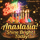 Bold golden lettering spelling Anastasia! on a gourmet chocolate cake with the subtext Shine Bright Today! on a gold stand.