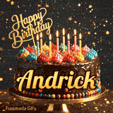 A gourmet chocolate cake on a stand with burning candles and a gold Happy Birthday topper, made for Andrick.
