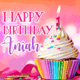 A vibrant birthday GIF featuring a rainbow-colored cupcake topped with white frosting, sprinkles, and a lit candle. The text reads 'Happy Birthday Aniah' in bold pink and violet letters with white outline.