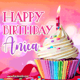 A vibrant birthday GIF featuring a rainbow-colored cupcake topped with white frosting, sprinkles, and a lit candle. The text reads 'Happy Birthday Anica' in bold pink and violet letters with white outline.