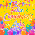 A bright and festive GIF with the text 'Feliz Cumpleaños Anja' in Spanish in colorful fonts, surrounded by confetti, balloons, and festive banners on a vibrant yellow background.