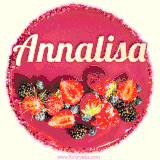 Beautifully decorated red velvet berry birthday cake with vibrant fruits and a glowing 'Annalisa' name, adding a touch of sweetness and sparkle.