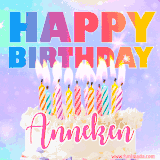 A vibrant animated name GIF with the words 'Happy Birthday Anneken' with colorful candles on a creamy cake. The background sparkles with pastel shades, adding a festive touch.