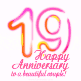 Stylish pink and yellow neon numbers '19' glowing brightly with a heartfelt 'Happy Anniversary to a beautiful couple!' written in pink cursive text.