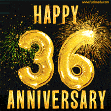 Bright golden balloons shaped like '36' with dazzling fireworks and 'Happy Anniversary' text shining on a black background.