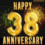 Bright golden balloons shaped like '38' with dazzling fireworks and 'Happy Anniversary' text shining on a black background.