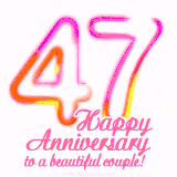 Stylish pink and yellow neon numbers '47' glowing brightly with a heartfelt 'Happy Anniversary to a beautiful couple!' written in pink cursive text.