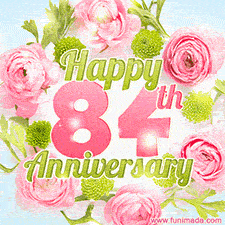 A gorgeous floral-themed 'Happy 84th Anniversary' with pink roses and green blossoms, surrounded by soft pastel accents, bringing elegance and joy.
