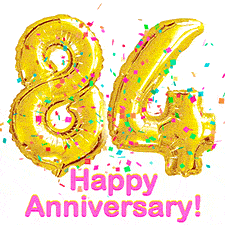 Sparkling gold balloons forming the number 84 with a burst of multicolored confetti and vibrant pink 'Happy Anniversary' text.