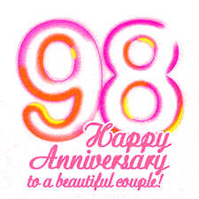 Stylish pink and yellow neon numbers '98' glowing brightly with a heartfelt 'Happy Anniversary to a beautiful couple!' written in pink cursive text.