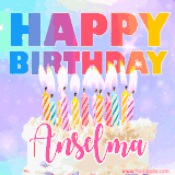 A vibrant animated name GIF with the words 'Happy Birthday Anselma' with colorful candles on a creamy cake. The background sparkles with pastel shades, adding a festive touch.