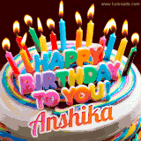 A colorful birthday cake topped with lit candles, with the words 'Happy Birthday Anshika' in bold glowing letters on a burgundy background. Animated flames add a festive touch.