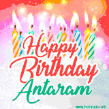 Bright birthday candles with rainbow flames on a cake, alongside the text 'Happy Birthday Antaram' in vibrant script in this celebratory animated GIF.