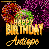 A golden 'Happy Birthday Antiope' message with vibrant fireworks in the background, creating a festive and celebratory vibe in this animated name GIF.