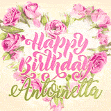 A stunning heart made of pink roses surrounds the elegant script text 'Happy Birthday Antoinetta' on a soft beige background. Animated sparkles add a magical and festive feel.