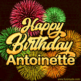 Golden text reading 'Happy Birthday Antoinette' surrounded by vibrant fireworks in red, green, and yellow, set against a dark background in this celebratory birthday GIF.