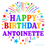 Happy Birthday Antoinette' GIF with rainbow-colored letters, colorful stars, and fireworks on white background.