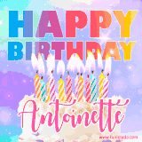A vibrant animated name GIF with the words 'Happy Birthday Antoinette' with colorful candles on a creamy cake. The background sparkles with pastel shades, adding a festive touch.