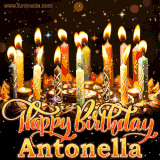 A glowing personalized birthday GIF with name Antonella featuring lit candles with intricate designs, warm lighting, and the text 'Happy Birthday' in an elegant font.