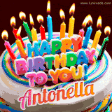 A colorful birthday cake topped with lit candles, with the words 'Happy Birthday Antonella' in bold glowing letters on a burgundy background. Animated flames add a festive touch.