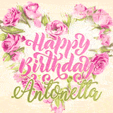 A stunning heart made of pink roses surrounds the elegant script text 'Happy Birthday Antonetta' on a soft beige background. Animated sparkles add a magical and festive feel.