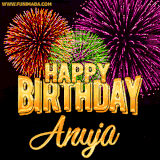 A golden 'Happy Birthday Anuja' message with vibrant fireworks in the background, creating a festive and celebratory vibe in this animated name GIF.