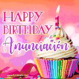 A vibrant birthday GIF featuring a rainbow-colored cupcake topped with white frosting, sprinkles, and a lit candle. The text reads 'Happy Birthday Anunciación' in bold pink and violet letters with white outline.