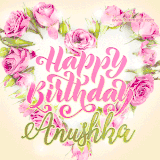 A stunning heart made of pink roses surrounds the elegant script text 'Happy Birthday Anushka' on a soft beige background. Animated sparkles add a magical and festive feel.