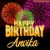 A golden 'Happy Birthday Anvika' message with vibrant fireworks in the background, creating a festive and celebratory vibe in this animated name GIF.