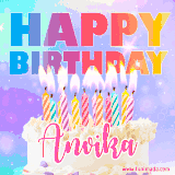 A vibrant animated name GIF with the words 'Happy Birthday Anvika' with colorful candles on a creamy cake. The background sparkles with pastel shades, adding a festive touch.