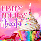 A vibrant birthday GIF featuring a rainbow-colored cupcake topped with white frosting, sprinkles, and a lit candle. The text reads 'Happy Birthday Anvita' in bold pink and violet letters with white outline.