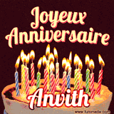 A Happy Birthday GIF in French featuring a festive birthday cake adorned with bright candles and the glowing text 'Joyeux Anniversaire Anvith' in a cheerful style.