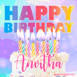 A vibrant animated name GIF with the words 'Happy Birthday Anvitha' with colorful candles on a creamy cake. The background sparkles with pastel shades, adding a festive touch.