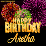 A golden 'Happy Birthday Aretha' message with vibrant fireworks in the background, creating a festive and celebratory vibe in this animated name GIF.
