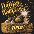 Celebrate Aria's birthday with a GIF featuring chocolate cake, a lit sparkler, and golden stars