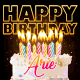 A vibrant animated GIF featuring a delicious birthday cake topped with glowing candles and the name 'Arie' in elegant script, and the words 'Happy Birthday' on the black background.