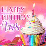 A vibrant birthday GIF featuring a rainbow-colored cupcake topped with white frosting, sprinkles, and a lit candle. The text reads 'Happy Birthday Aries' in bold pink and violet letters with white outline.