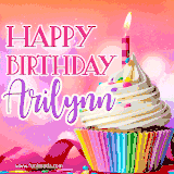 A vibrant birthday GIF featuring a rainbow-colored cupcake topped with white frosting, sprinkles, and a lit candle. The text reads 'Happy Birthday Arilynn' in bold pink and violet letters with white outline.