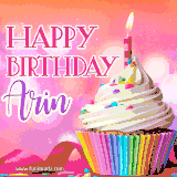 A vibrant birthday GIF featuring a rainbow-colored cupcake topped with white frosting, sprinkles, and a lit candle. The text reads 'Happy Birthday Arin' in bold pink and violet letters with white outline.
