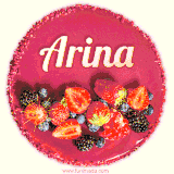 Beautifully decorated red velvet berry birthday cake with vibrant fruits and a glowing 'Arina' name, adding a touch of sweetness and sparkle.