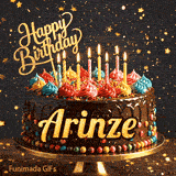 Bright candles flickering on a festive chocolate cake with the name Arinze displayed in golden letters.