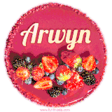 Beautifully decorated red velvet berry birthday cake with vibrant fruits and a glowing 'Arwyn' name, adding a touch of sweetness and sparkle.