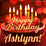 Beautifully decorated red velvet berry birthday cake with vibrant fruits and a glowing 'Ashlynn' name, adding a touch of sweetness and sparkle.