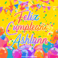 A bright and festive GIF with the text 'Feliz Cumpleaños Ashlynn' in Spanish in colorful fonts, surrounded by confetti, balloons, and festive banners on a vibrant yellow background.