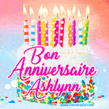 A white birthday cake covered in colorful sprinkles, topped with bright candles, and French text 'Bon Anniversaire Ashlynn' on a pastel gradient background in an animated GIF.
